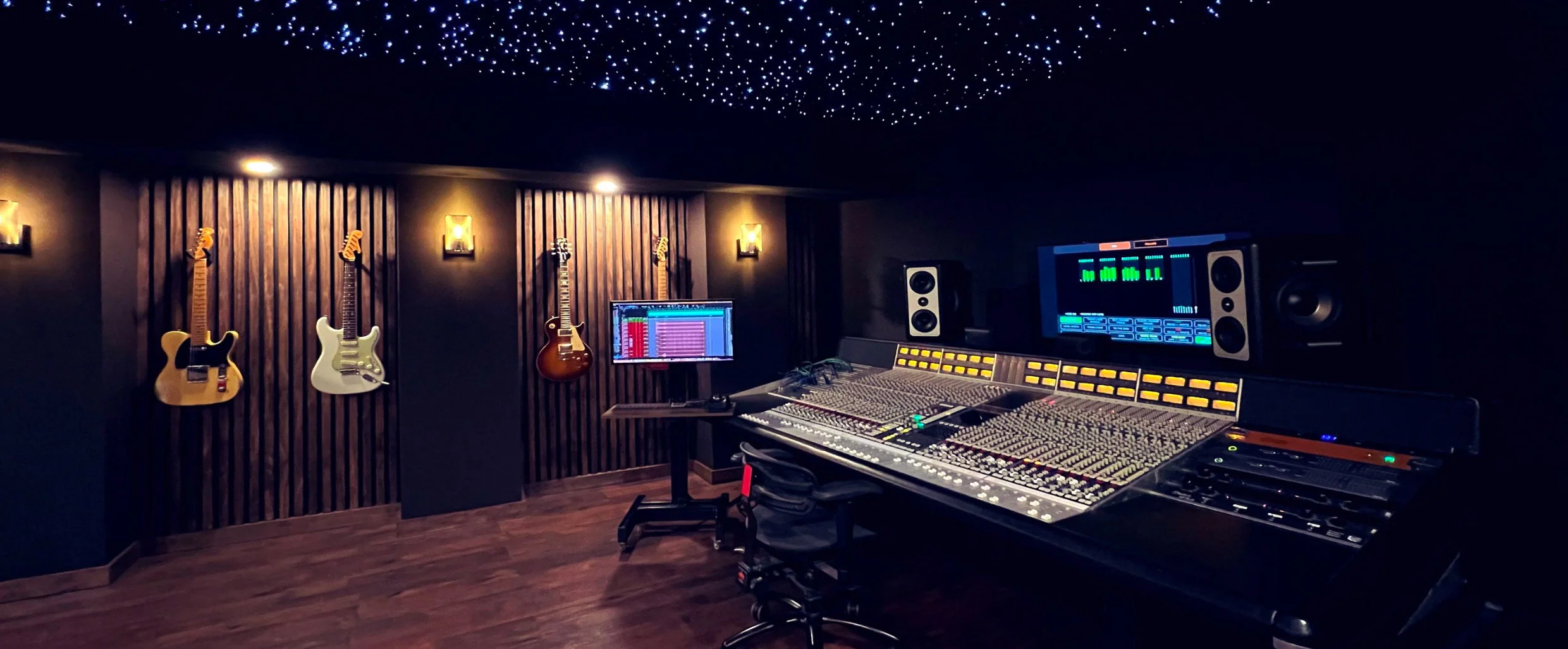 Professional recording studio with acoustic soundproofing panels and controlled audio environment
