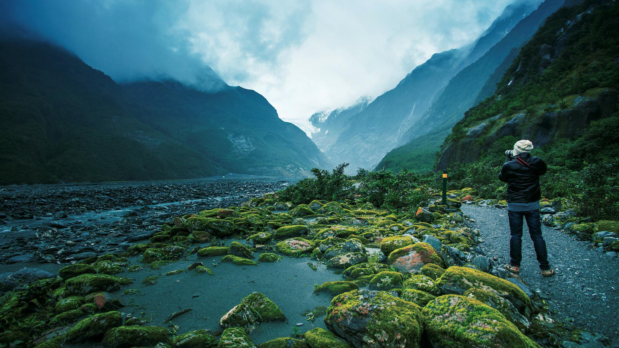 Location fixer conducting on-ground scouting to assess access, logistics, and local conditions before filming