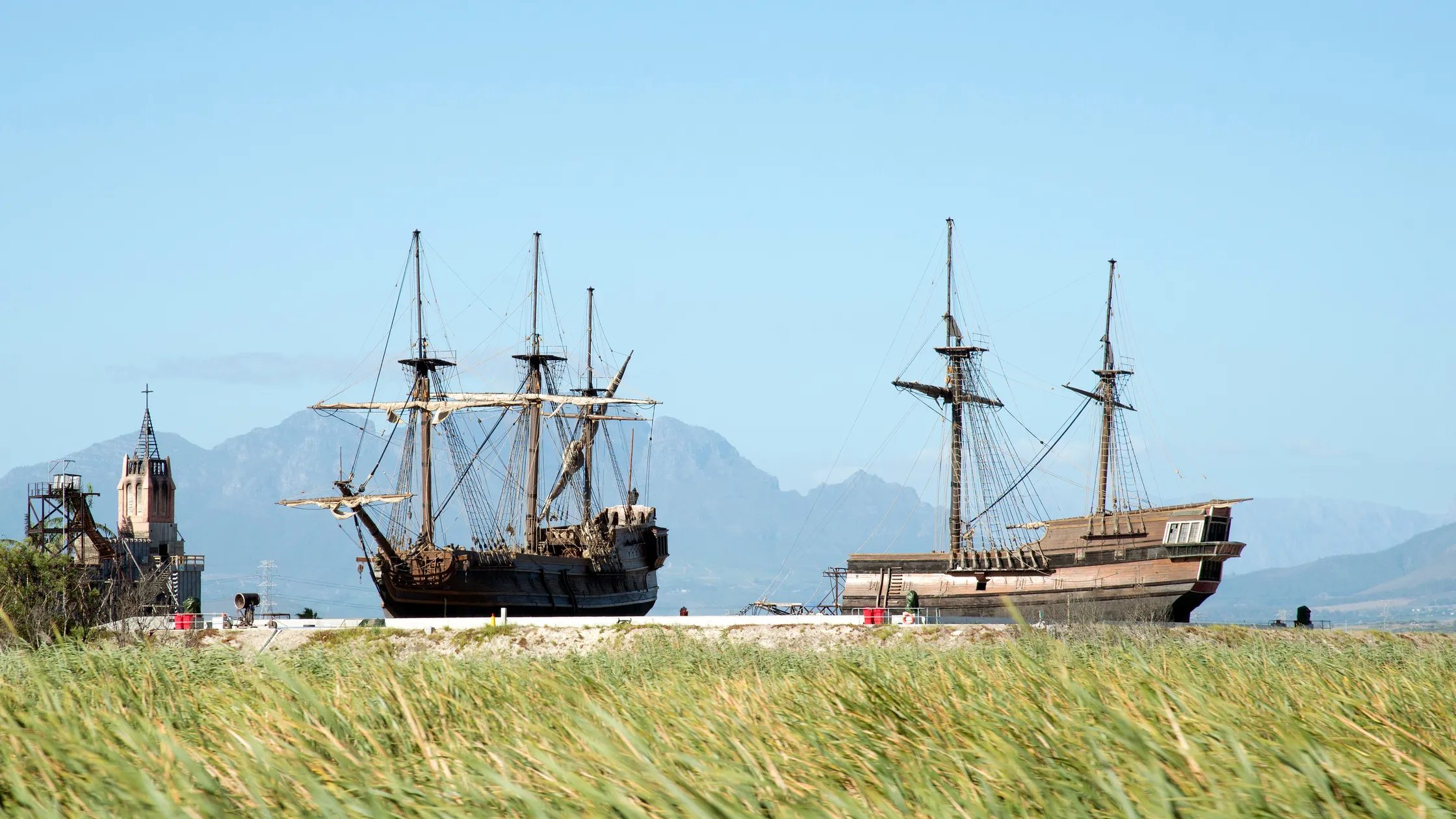 Cape Town harbor pirate ship set used for large-scale maritime filming and historical action sequences